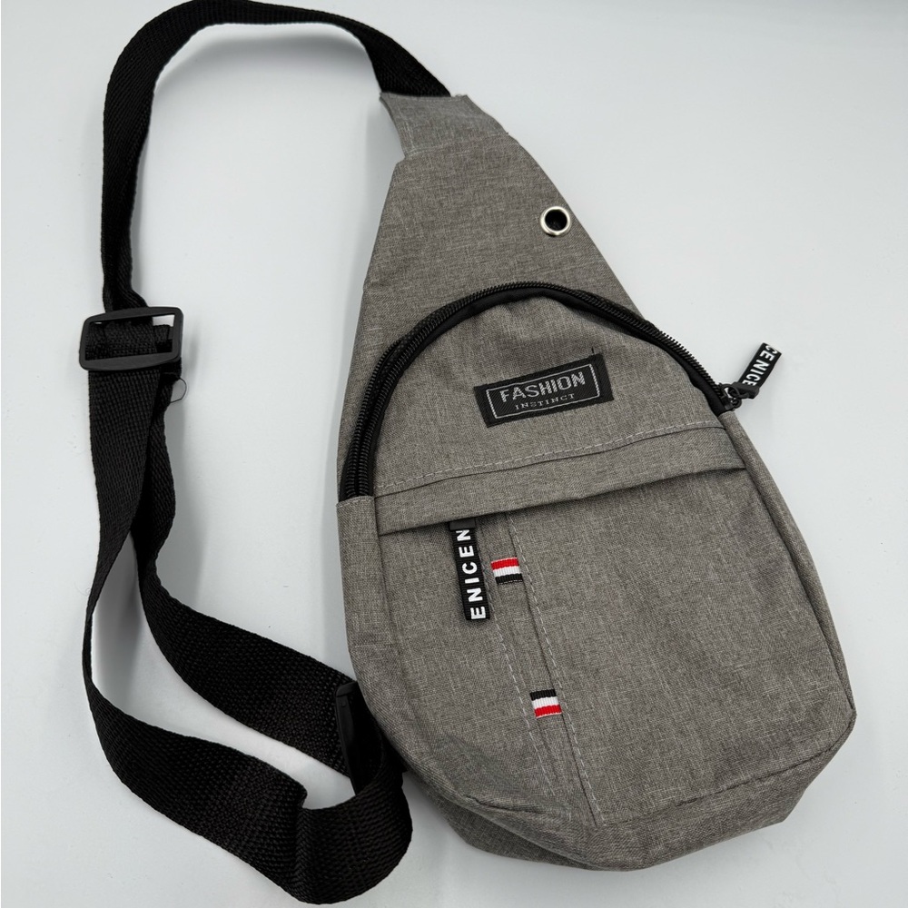 NEW w/o tag. Lightweight sling backpack.